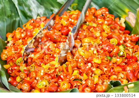 Chopped red and orange chillies 133800514