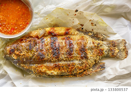 Grilled tilapia fish with salt 133800537