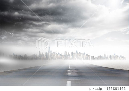 Flat design roadway is stretching toward foggy city skyline under storm clouds with lightning flash 133801161
