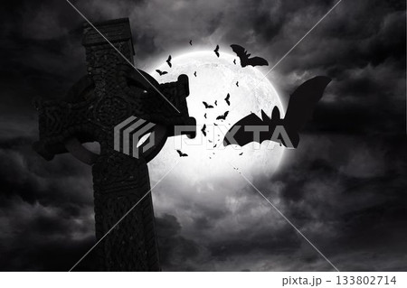 Digital image of bats flying by celtic cross Digital image of bats flying by celtic cross 133802714