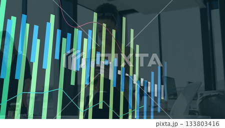 In office, business person analyzing financial charts and graphs on desk In office, business person analyzing financial charts and graphs on desk 133803416