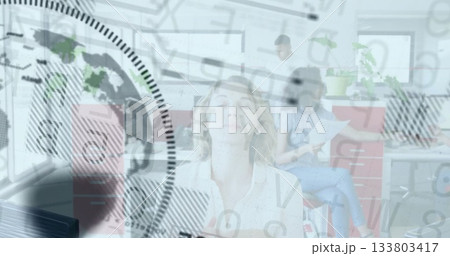 Business people in office with data processing image overlaying their activities Business people in office with data processing image overlaying their activities 133803417