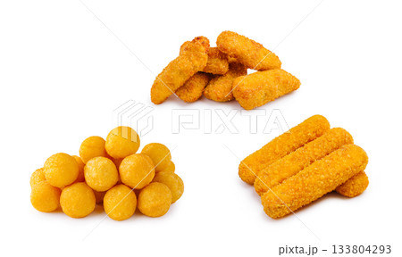 Variety of golden fried snacks arranged on a plain background Variety of golden fried snacks arranged on a plain background 133804293