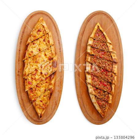 Delicious Turkish pide served on wooden platters at a restaurant 133804296