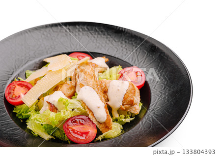 Fresh salad with grilled chicken, lettuce, tomatoes, and creamy dressing Fresh salad with grilled chicken, lettuce, tomatoes, and creamy dressing 133804393