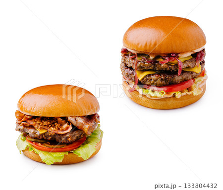 Delicious burgers served on a wooden table at a casual dining spot 133804432