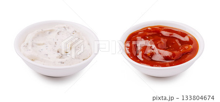 Two bowls of dipping sauces, one creamy and one tangy at a snack time Two bowls of dipping sauces, one creamy and one tangy at a snack time 133804674