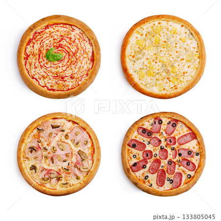 Delicious variety of four pizzas with different toppings on a white background Delicious variety of four pizzas with different toppings on a white background 133805045
