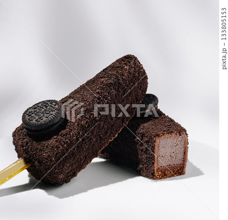 Delicious chocolate ice cream bars with cookie topping on a light background 133805153
