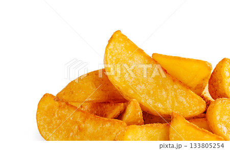 Golden potato wedges served on a white background ready for tasting Golden potato wedges served on a white background ready for tasting 133805254