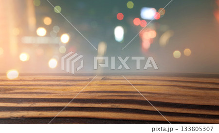 Rustic wooden table surface with colorful bokeh lights background. Mockup, template, or copy space. Product display and promotional content 133805307