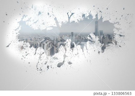 Splash on wall revealing cityscape 133806563