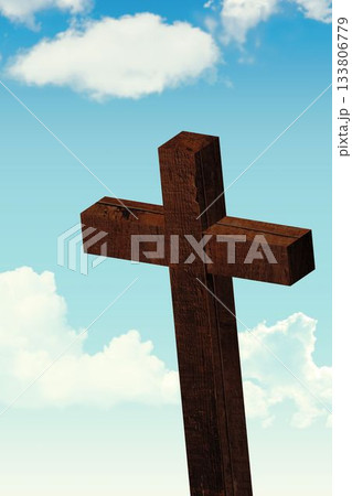 Flat design wooden Latin cross is standing against clear blue sky with scattered white clouds Flat design wooden Latin cross is standing against clear blue sky with scattered white clouds 133806779