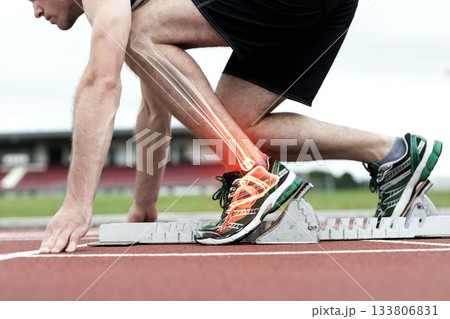 Runner experiencing ankle pain Runner experiencing ankle pain 133806831