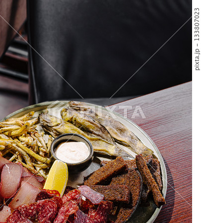 Delicious variety of seafood and meats served on a platter 133807023