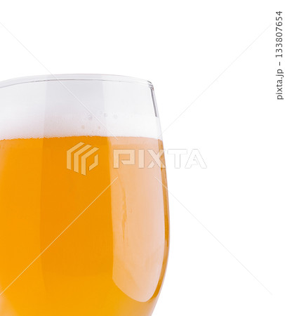 Refreshing golden beer in a clear glass ready for enjoyment 133807654