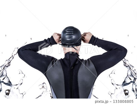 Rear view of swimmer against white background 133808805