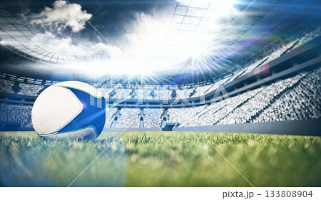 Football on field in stadium. Football on field in stadium. 133808904