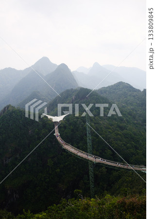 The Sky Bridge is an observation deck at the top of the mountains on the island of Langkawi. Observation deck. Malaysia The Sky Bridge is an observation deck at the top of the mountains on the island of Langkawi. Observation deck. Malaysia 133809845