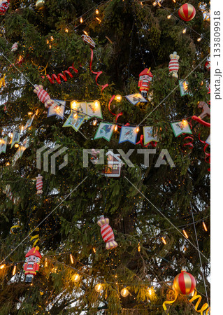 Christmas tree with lights and decorations, including Santa Claus ornament. Christmas tree with lights and decorations, including Santa Claus ornament. 133809918