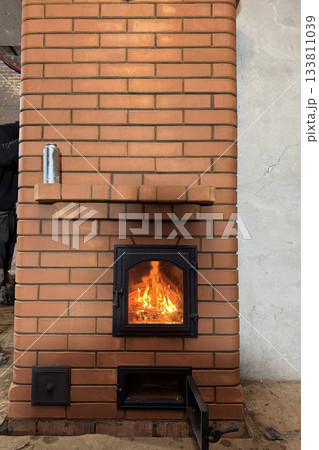 Construction of a heating stove. Test firing of the stove. Construction of a heating stove. Test firing of the stove. 133811039
