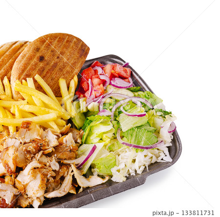 Tasty grilled chicken, fresh salad, and crispy fries for lunch Tasty grilled chicken, fresh salad, and crispy fries for lunch 133811731