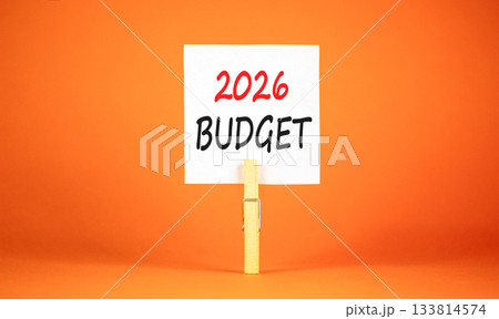 2026 Budget symbol. Concept words 2026 Budget on beautiful white paper on wooden clothespin. Beautiful orange background. Business and 2026 budget concept. Copy space. 133814574