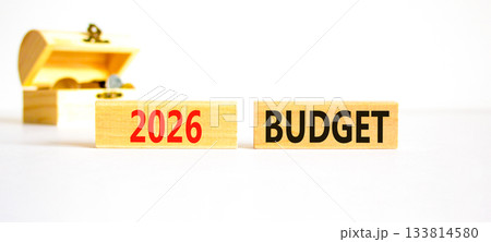 2026 Budget symbol. Concept words 2026 Budget on beautiful wooden blocks. Beautiful white paper background. Beautiful wooden chest with coins. Business and 2026 budget concept. Copy space. 2026 Budget symbol. Concept words 2026 Budget on beautiful wooden blocks. Beautiful white paper background. Beautiful wooden chest with coins. Business and 2026 budget concept. Copy space. 133814580