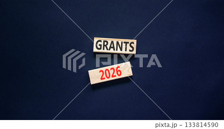 Grants 2026 symbol. Concept words Grants 2026 on beautiful wooden blocks. Beautiful black paper background. Business and grants 2026 concept. Copy space. 133814590