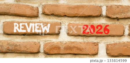 Review 2026 symbol. Concept words Review 2026 on beautiful brown brick wall. Beautiful brown brick wall background. Business and review 2026 concept. Copy space. Review 2026 symbol. Concept words Review 2026 on beautiful brown brick wall. Beautiful brown brick wall background. Business and review 2026 concept. Copy space. 133814599