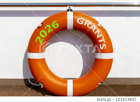 2026 Grants symbol. Concept words 2026 Grants on beautiful orange lifebuoy. Beautiful white background. Beautiful orange lifebuoy. Business and 2026 grants concept. Copy space. 133814607