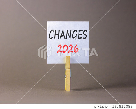 Changes 2026 symbol. Concept words Changes 2026 on beautiful white paper on wooden clothespin. Beautiful grey background. Business and changes 2026 concept. Copy space. Changes 2026 symbol. Concept words Changes 2026 on beautiful white paper on wooden clothespin. Beautiful grey background. Business and changes 2026 concept. Copy space. 133815085