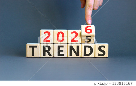 2026 Trends new year symbol. Concept words 2026 Trends on beautiful wooden blocks. Beautiful grey paper background. Businessman's hand. Business and 2026 Trends new year concept. Copy space. 2026 Trends new year symbol. Concept words 2026 Trends on beautiful wooden blocks. Beautiful grey paper background. Businessman's hand. Business and 2026 Trends new year concept. Copy space. 133815167