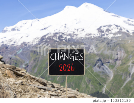 Changes 2026 symbol. Concept words Changes 2026 on beautiful black blackboard. Beautiful mountain Elbrus and blue sky background. Business and changes 2026 concept. Copy space. 133815189