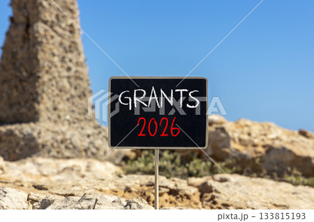 Grants 2026 symbol. Concept words Grants 2026 on beautiful black blackboard. Beautiful stone and blue sky background. Business and grants 2026 concept. Copy space. Grants 2026 symbol. Concept words Grants 2026 on beautiful black blackboard. Beautiful stone and blue sky background. Business and grants 2026 concept. Copy space. 133815193