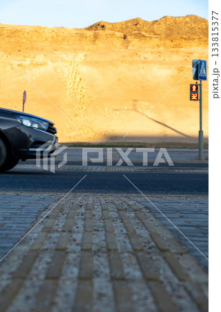 Traffic lights on red signal at a crosswalk Traffic lights on red signal at a crosswalk 133815377