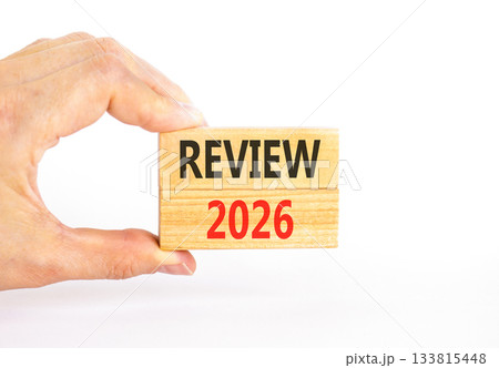 Review 2026 symbol. Concept words Review 2026 on beautiful wooden blocks. Beautiful white paper background. Businessman's hand. Business and review 2026 concept. Copy space. Review 2026 symbol. Concept words Review 2026 on beautiful wooden blocks. Beautiful white paper background. Businessman's hand. Business and review 2026 concept. Copy space. 133815448