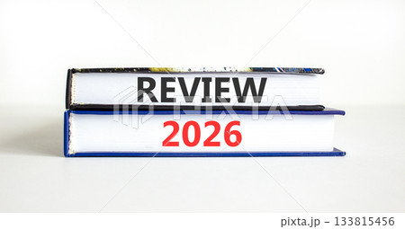 Review 2026 symbol. Concept words Review 2026 on beautiful books. Beautiful white paper background. Business and review 2026 concept. Copy space. Review 2026 symbol. Concept words Review 2026 on beautiful books. Beautiful white paper background. Business and review 2026 concept. Copy space. 133815456