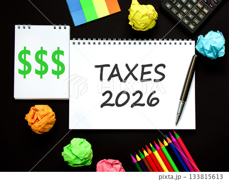 Taxes 2026 new year symbol. Concept words Taxes 2026 on beautiful white note. Beautiful black paper background. Beautiful black pen, calculator. Business and taxes 2026 new year concept. Copy space. Taxes 2026 new year symbol. Concept words Taxes 2026 on beautiful white note. Beautiful black paper background. Beautiful black pen, calculator. Business and taxes 2026 new year concept. Copy space. 133815613