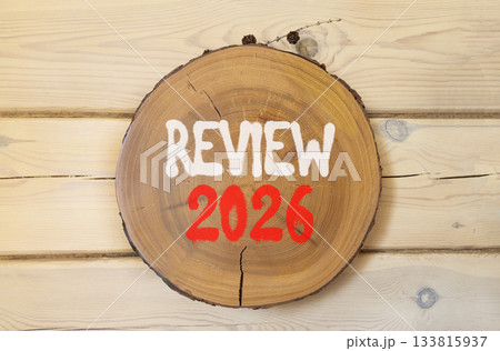 Review 2026 symbol. Concept words Review 2026 on beautiful wooden circle. Beautiful wooden wall background. Business and review 2026 concept. Copy space. Review 2026 symbol. Concept words Review 2026 on beautiful wooden circle. Beautiful wooden wall background. Business and review 2026 concept. Copy space. 133815937