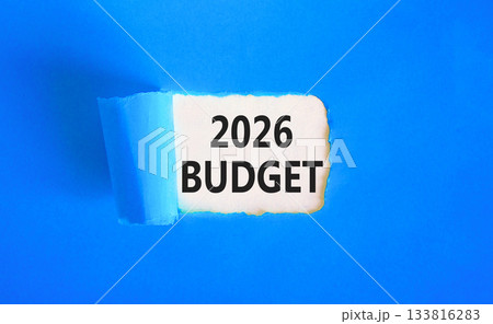 2026 Budget symbol. Concept words 2026 Budget on beautiful white paper. Beautiful blue paper background. Business and 2026 budget concept. Copy space. 2026 Budget symbol. Concept words 2026 Budget on beautiful white paper. Beautiful blue paper background. Business and 2026 budget concept. Copy space. 133816283