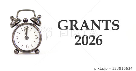Grants 2026 symbol. Concept words Grants 2026 on beautiful white paper. Beautiful white paper background. Beautiful black alarm clock. Business and grants 2026 concept. Copy space. 133816634