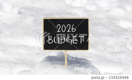 2026 Budget symbol. Concept words 2026 Budget on beautiful black blackboard. Beautiful white snow background. Business and 2026 budget concept. Copy space. 2026 Budget symbol. Concept words 2026 Budget on beautiful black blackboard. Beautiful white snow background. Business and 2026 budget concept. Copy space. 133816946