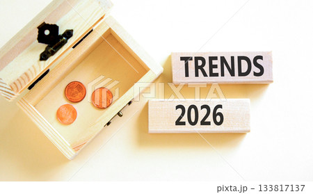 Trends 2026 symbol. Concept words Trends 2026 on beautiful wooden blocks. Beautiful white paper background. Beautiful wooden chest with coins. Business and Trends 2026 new year concept. Copy space. 133817137
