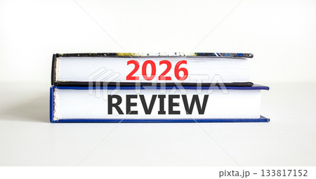 2026 Review symbol. Concept words 2026 Review on beautiful books. Beautiful white paper background. Business and 2026 review concept. Copy space. 133817152