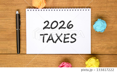 2026 taxes new year symbol. Concept words 2026 taxes on beautiful white note. Beautiful wooden background. Black pen. Colored paper. Business and 2026 taxes new year concept. Copy space. 2026 taxes new year symbol. Concept words 2026 taxes on beautiful white note. Beautiful wooden background. Black pen. Colored paper. Business and 2026 taxes new year concept. Copy space. 133817222