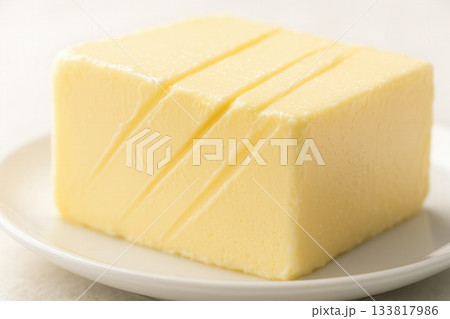 Creamy Butter Block With Clean Slices On White Plate 133817986