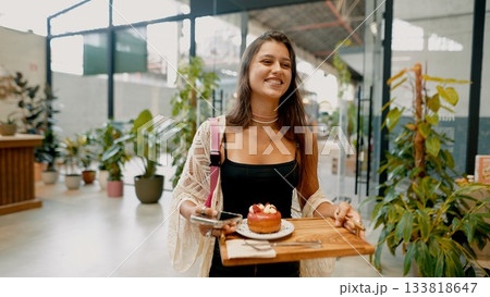 Delightful Moment in a Cozy Caf with a Delicious Dessert Delightful Moment in a Cozy Caf with a Delicious Dessert 133818647