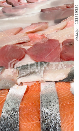 An Exquisite Display of Fresh Assorted Cuts of Fish Perfect for Your Culinary Delight 133819589