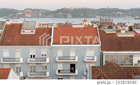 Stunning rooftops with breathtaking water views and unique architecture in a vibrant city Stunning rooftops with breathtaking water views and unique architecture in a vibrant city 133819590